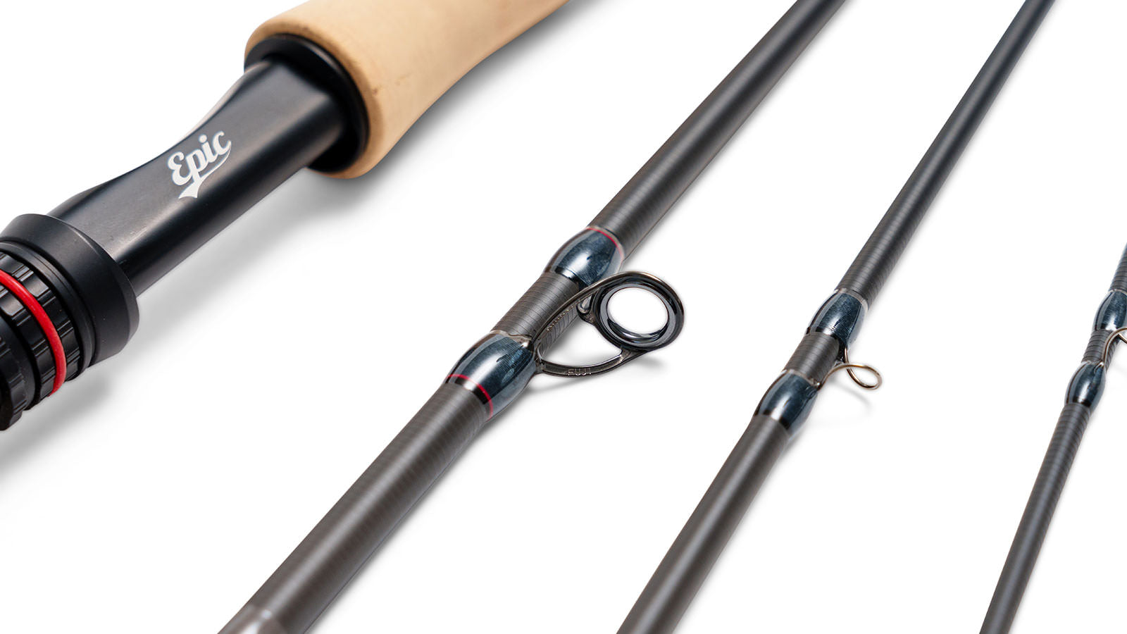 Graphite fly rod with a titanium stripping guide